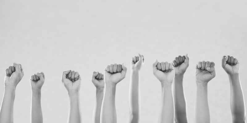 Image of raised fists